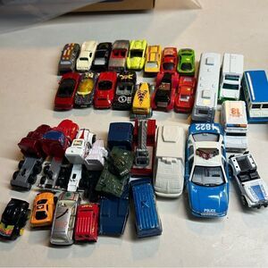 35 mini diecast vehicles, military to rv’s